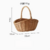 Hand woven hand-held basket