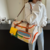 Portable and crossbody fitness bag and duffel bag