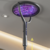 Mosquito-attracting telescopic and rotatable electric mosquito swatter