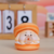 Unzip the macaron squishy toy