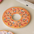 Donut-shaped diatom mud coasters
