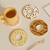 Donut-shaped diatom mud coasters