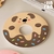 Donut-shaped diatom mud coasters