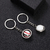 Rotating ball-shaped metal keychain