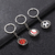 Rotating ball-shaped metal keychain