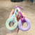 Grip trainer stress-relief keychain pendant
