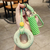 Grip trainer stress-relief keychain pendant