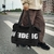Expandable wheeled travel bag with retractable handle